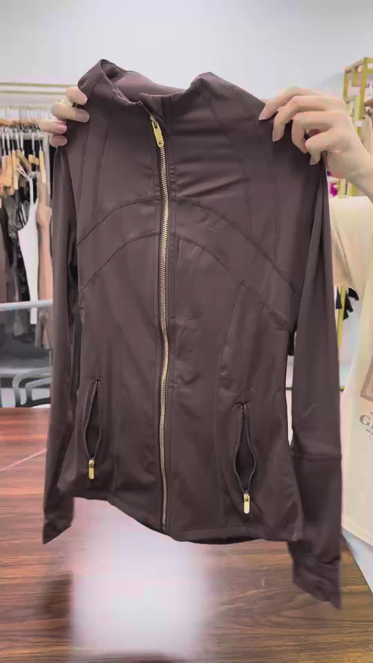 Conjunto deportivo de dos piezas con chaqueta y pantalon acampanado
